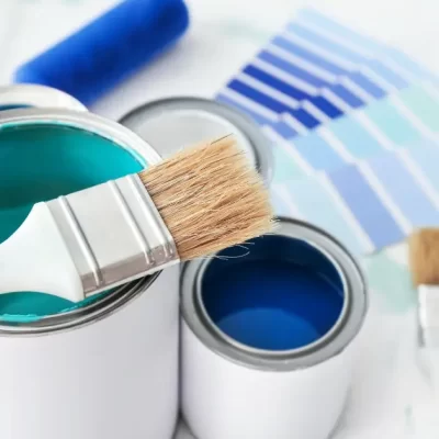 picture of paint cans and brush